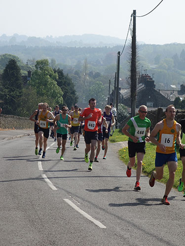 Runners racing up Loads Road