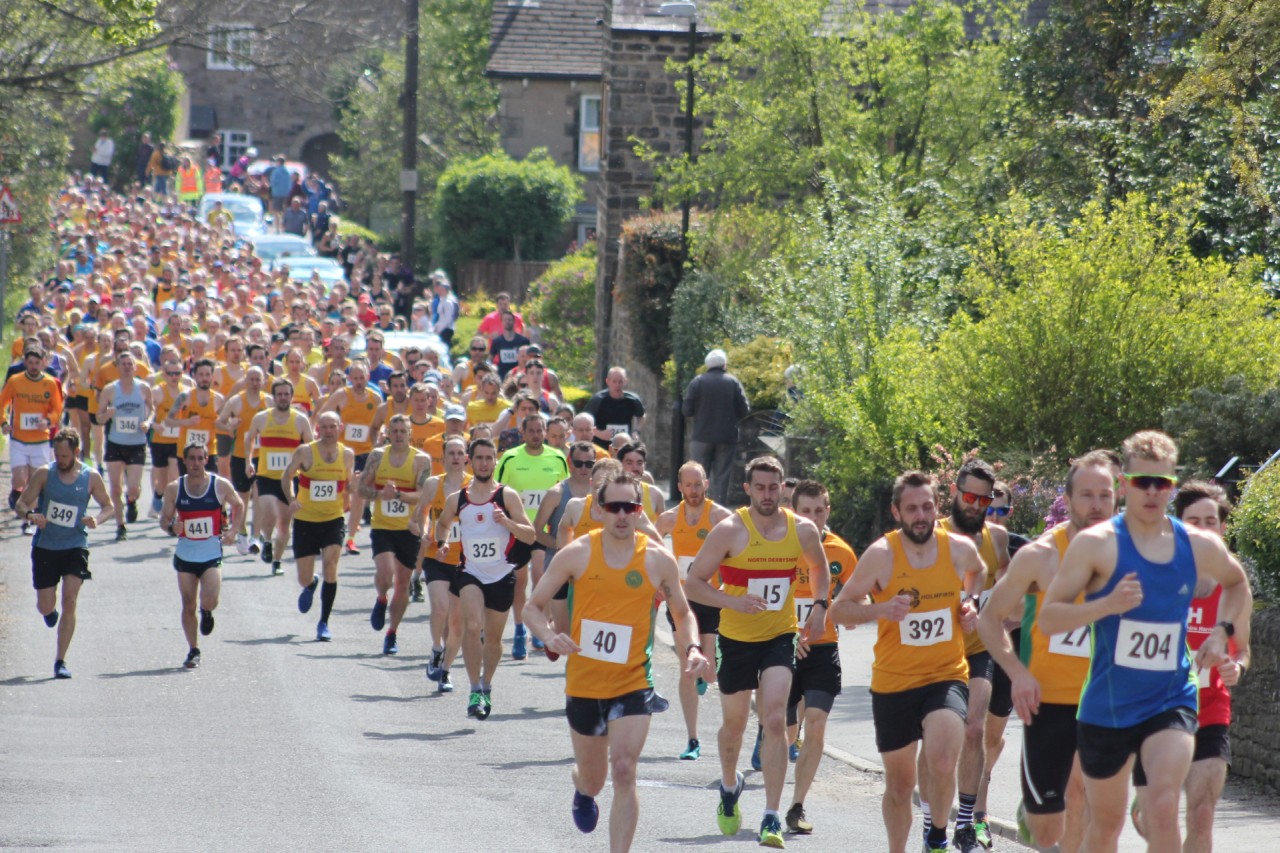 Runners racing up Loads Road